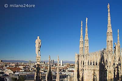 View from cathedral roof over Milan to the Swiss Alps